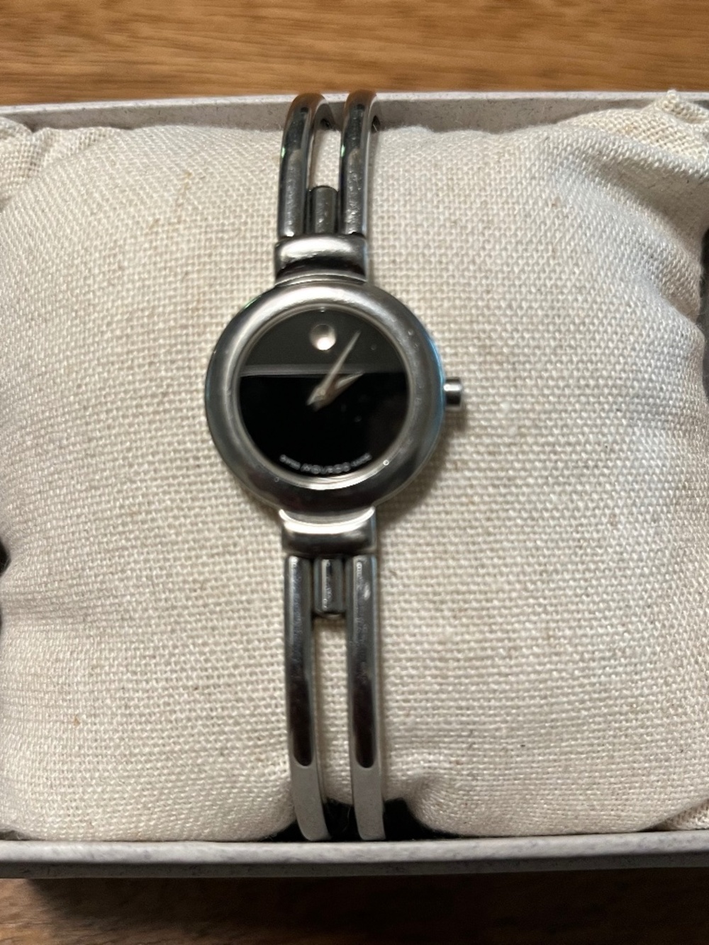 Movado black face ladies watch